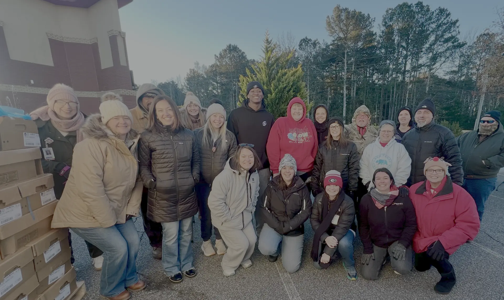 The full volunteer team gathered at the Christmas with Chris toy drive